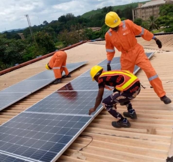 Family admiring their new solar panel system.