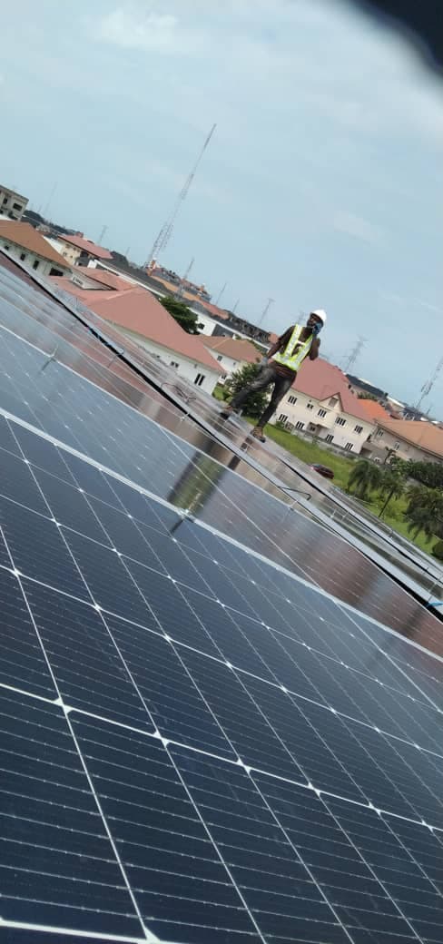Family admiring their new solar panel system.