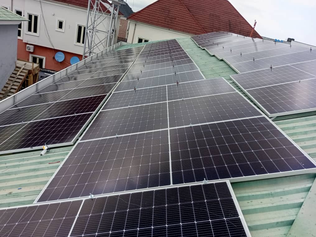 Close-up of a solar inverter and battery storage system.