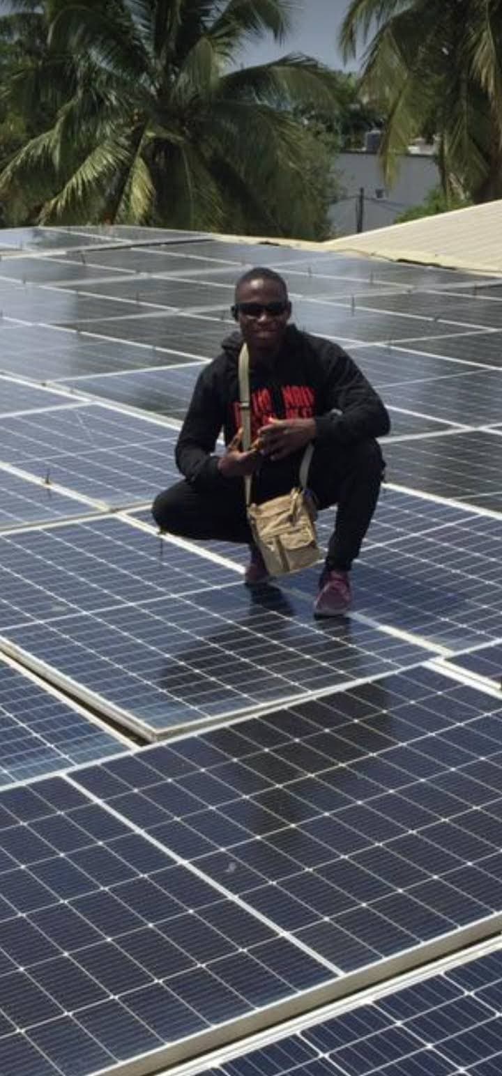 Family admiring their new solar panel system.